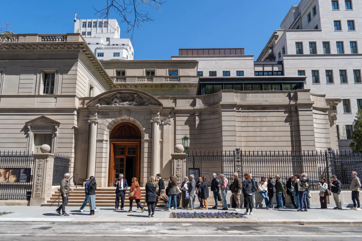 People wait to enter The Frick Collection after its reopening in New York on April 17, 2025. (Samira Bouaou/The Epoch Times)