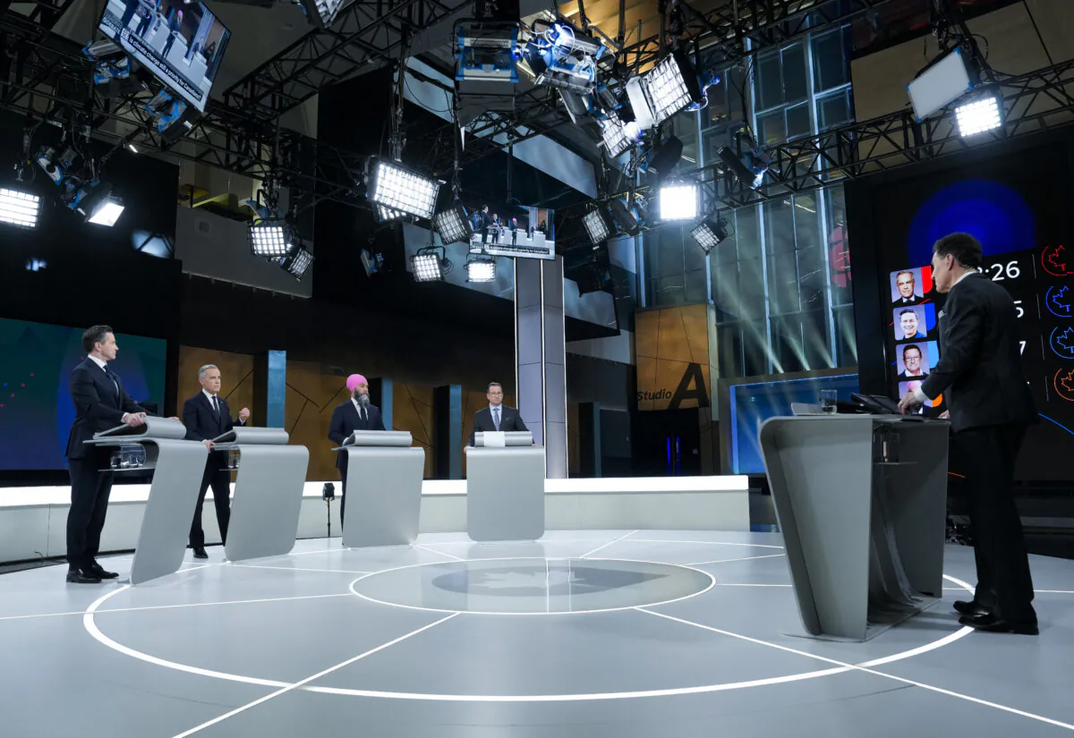 (L-R) Conservative Leader Pierre Poilievre, Liberal Leader Mark Carney, NDP Leader Jagmeet Singh, and Bloc Québécois Leader Yves-François Blanchet participate in the English-language federal leaders' debate in Montreal, on April 17, 2025. (Adrian Wyld/POOL/AFP via Getty Images)