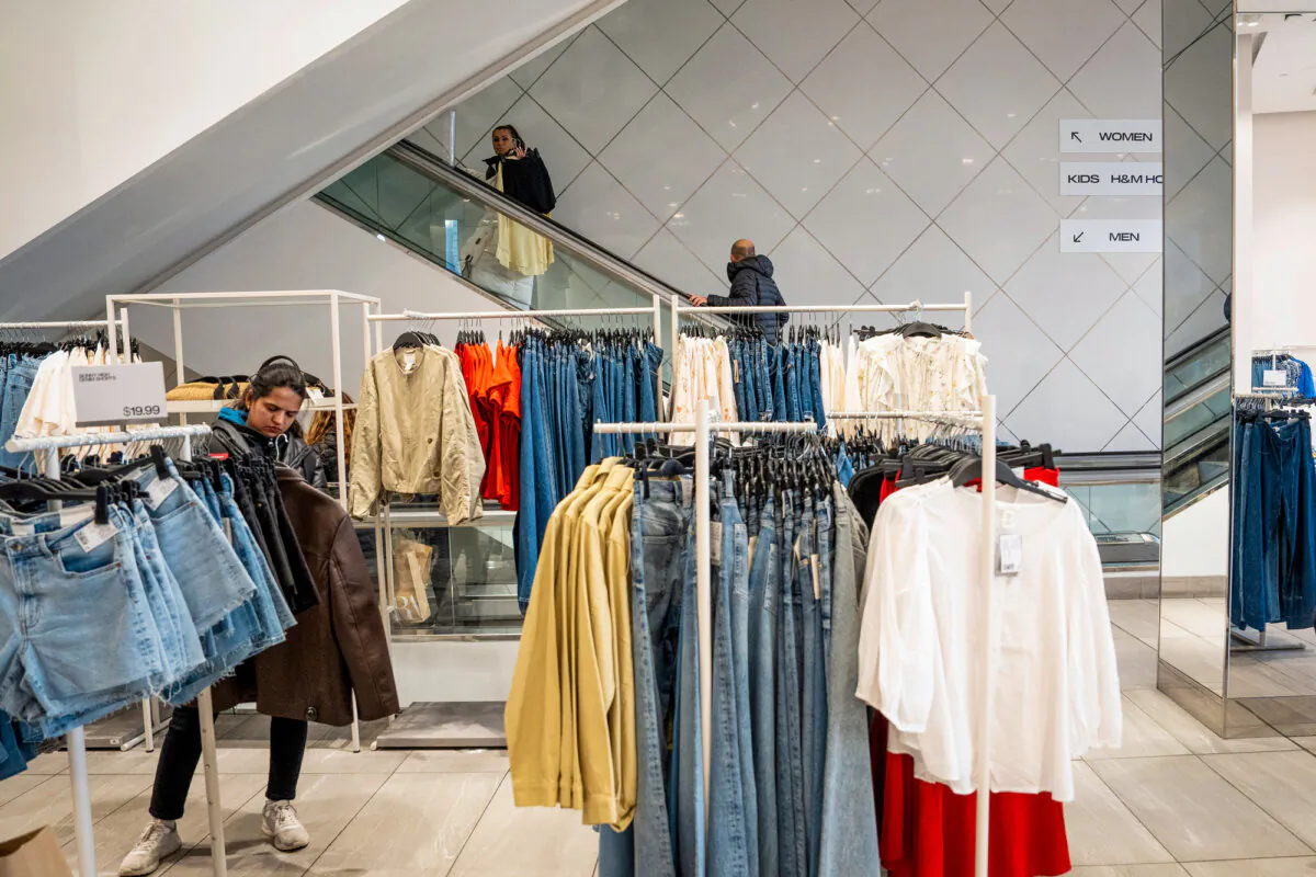 People shop at a retail store in New York City, on March 21, 2025. (Samira Bouaou/The Epoch Times)