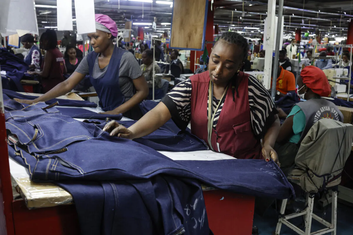 Workers perform a quality check inside the United Aryan textile factory at the Export Processing Zone in Nairobi, Kenya, on Feb. 4, 2025. (Simon Maina/AFP via Getty Images)