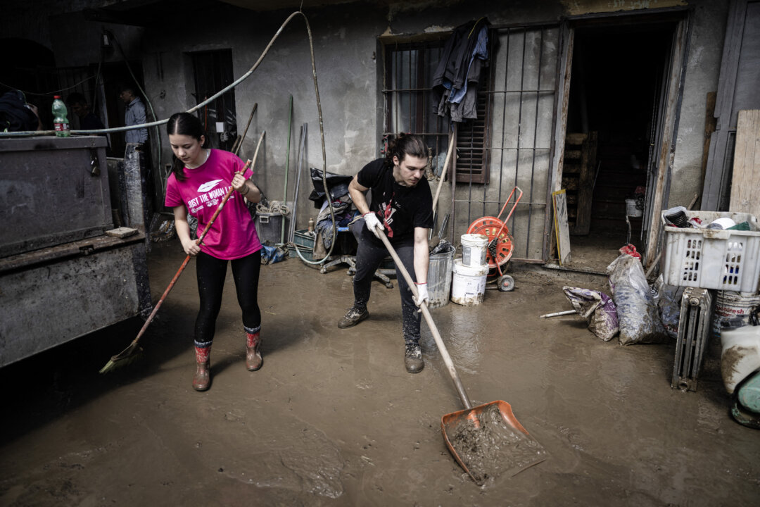 NextImg:Day in Photos: Flood in Italy, Easter Performance, and Star Wars Celebrations