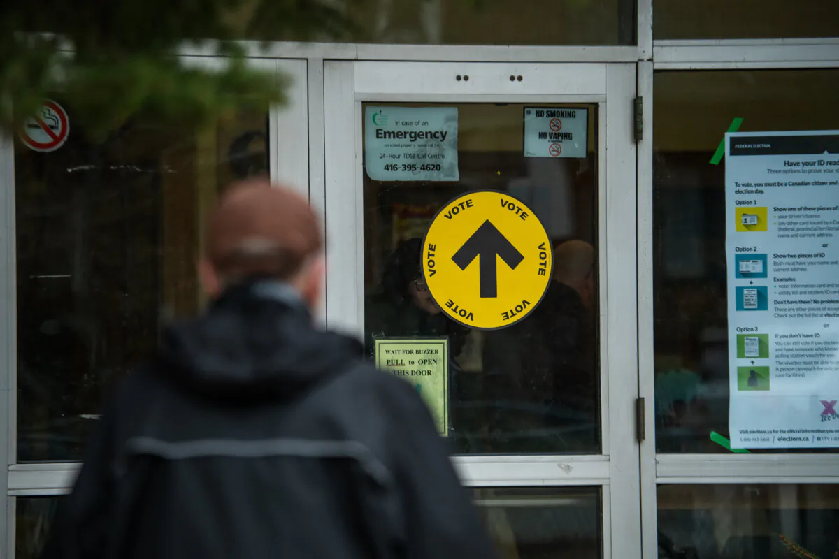 Elections Canada signage is seen at an advance polling location, in Toronto, on April 18, 2025. (The Canadian Press/Laura Proctor)