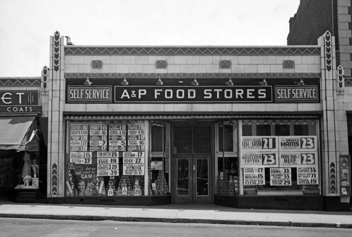The windows of an A&P supermarket are covered with posters advertising products, circa 1940. The Great Atlantic & Pacific Tea Company (or A&P) operated from 1859 to 2015. (A.E. French/Frederic Lewis/Archive Photos/Getty Images)