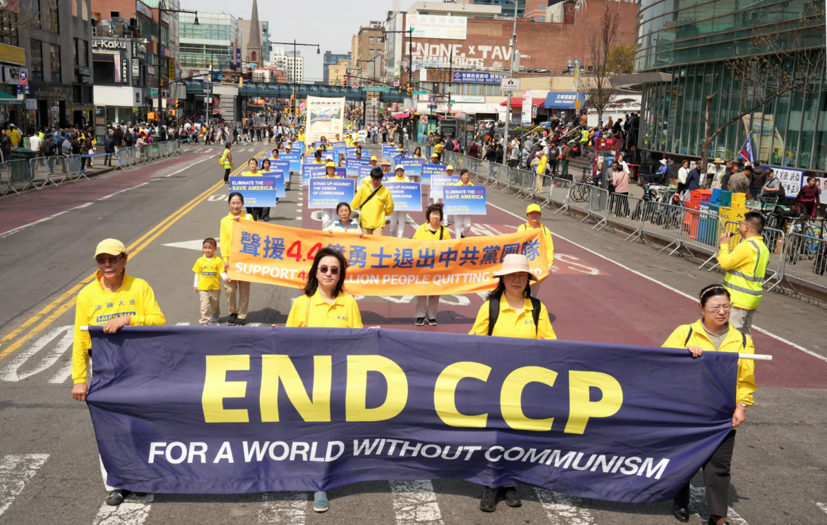 Falun Gong practitioners attend a parade to call for the end of the persecution in China and support the 440 million who have quit the Chinese Communist Party. (Larry Dye/The Epoch Times)