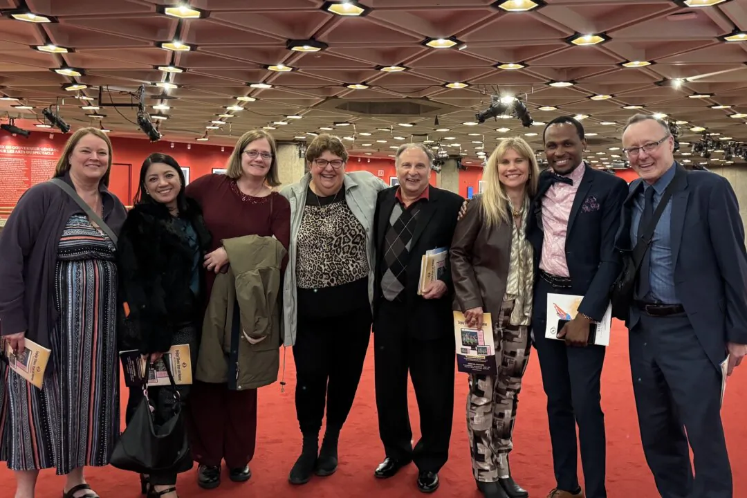 Glen Costell (R) and family enjoyed Shen Yun at the National Arts Centre in Ottawa, Ontario, Canada, on April 19, 2025. (Weiya Yang/The Epoch Times)