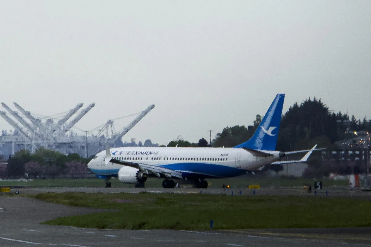 A Boeing 737 MAX plane, intended for China's Xiamen Airlines, arrives at King County International Airport after returning from China because of ongoing tariff disputes, in Seattle on April 19, 2025. (Dan Catchpole/Reuters)