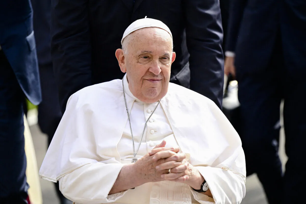 Pope Francis arrives for a visit to St. Theresa's Home, a Catholic nursing home, in Singapore on Sept. 13, 2024. (Tiziana Fabi/AFP)