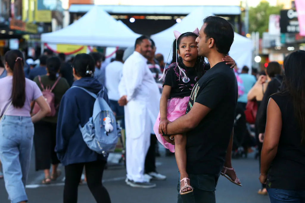 Sydneysiders celebrating Diwali at a street festival in the suburb of Wentworthville in Sydney, Australia on Oct. 29, 2022. The Diwali festival, one of Hinduism's biggest, is celebrated by Indian-origin people across the world. (Lisa Maree Williams/Getty Images)