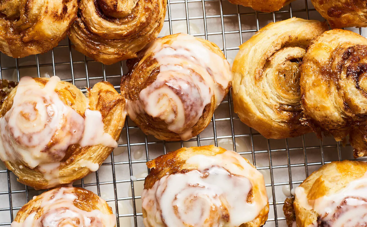 These shortcut cinnamon rolls start with buttery, flaky store-bought puff pastry. (Joe Lingeman/TCA)