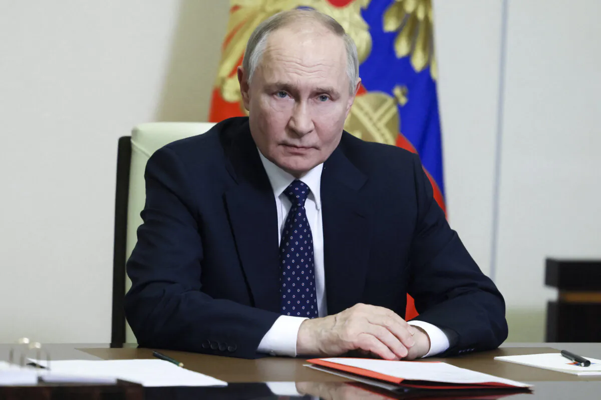 Russian President Vladimir Putin chairs a Security Council meeting via videoconference at the Novo-Ogaryovo state residence outside Moscow on March 14, 2025. (Aleksey Babushkin / POOL / AFP)