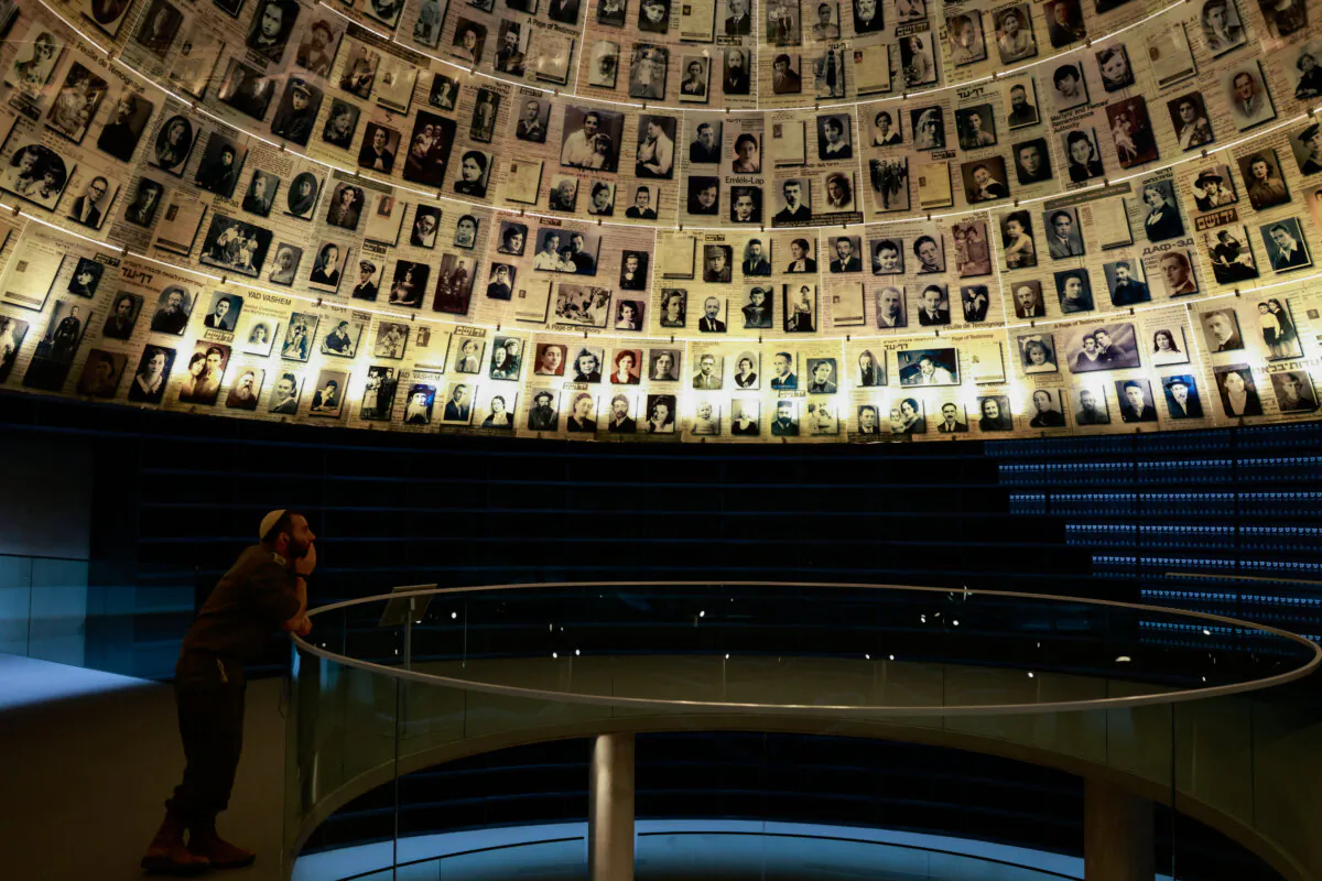 A visitor tours the Yad Vashem Holocaust Memorial museum in Jerusalem on April 23, 2025, on the eve of the Holocaust Remembrance Day, which commemorates the six million Jews killed in World War II. (Photo by Menahem Kahana/AFP via Getty Images)