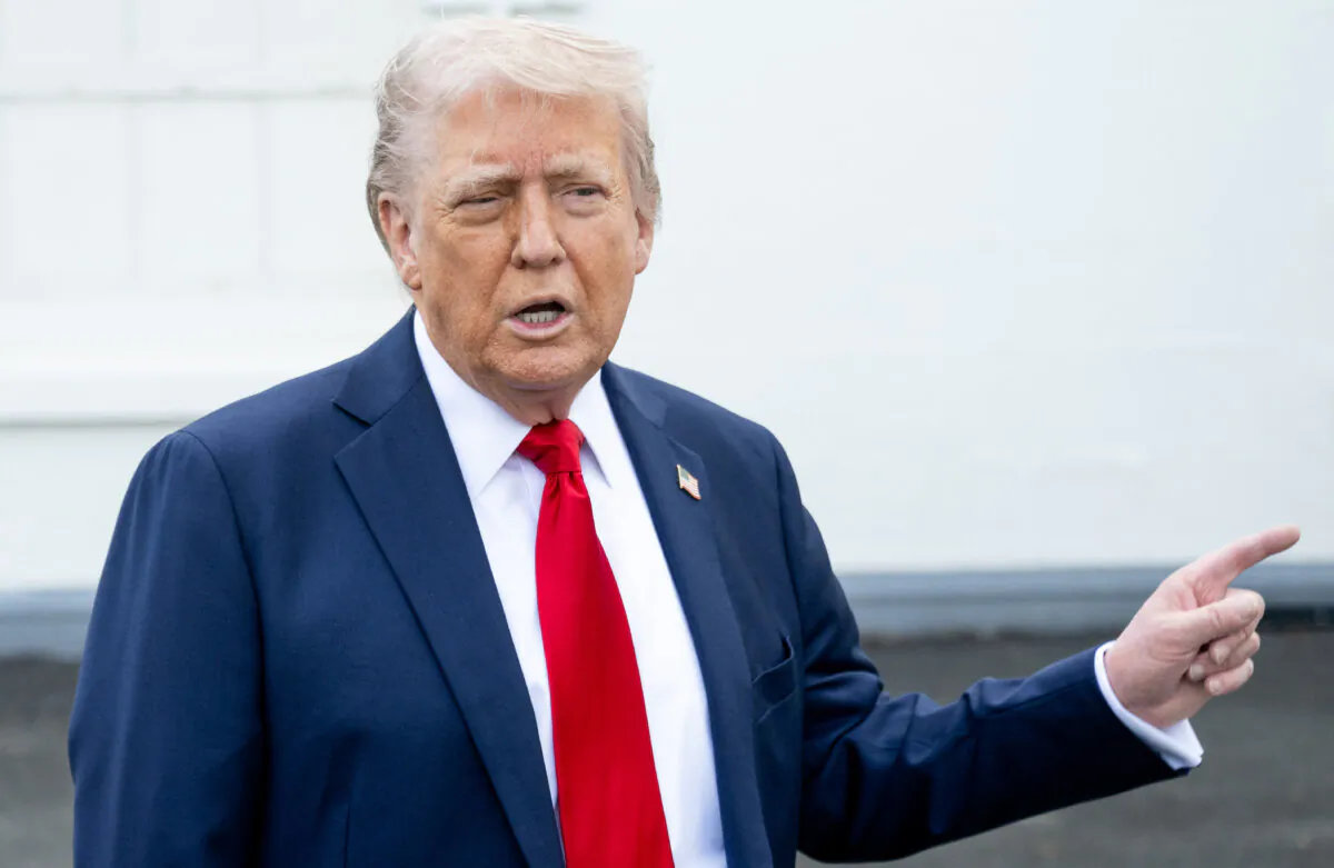 U.S. President Donald Trump speaks with reporters outside the White House in Washington, on April 23, 2025. (Saul Loeb/AFP via Getty Images)
