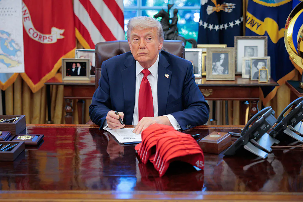 President Donald Trump signs executive orders in the Oval Office at the White House on April 23, 2025. (Chip Somodevilla/Getty Images)
