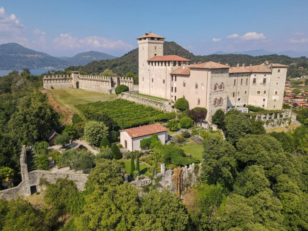 Borromeo Castle’s growth can be traced to its various hillside sections. At the top of the hill is the original fortified lookout tower and the Visconti Wing, followed by the western end of the small palazzo and the Visconti Tower. (Stefano Ember/Shutterstock)