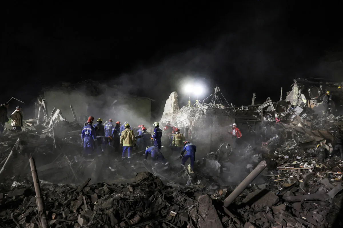 Ukrainian rescuers operate at the site of a Russian missile attack in Kyiv amid the Russian invasion of Ukraine early on April 24, 2025. (STRINGER/AFP via Getty Images)