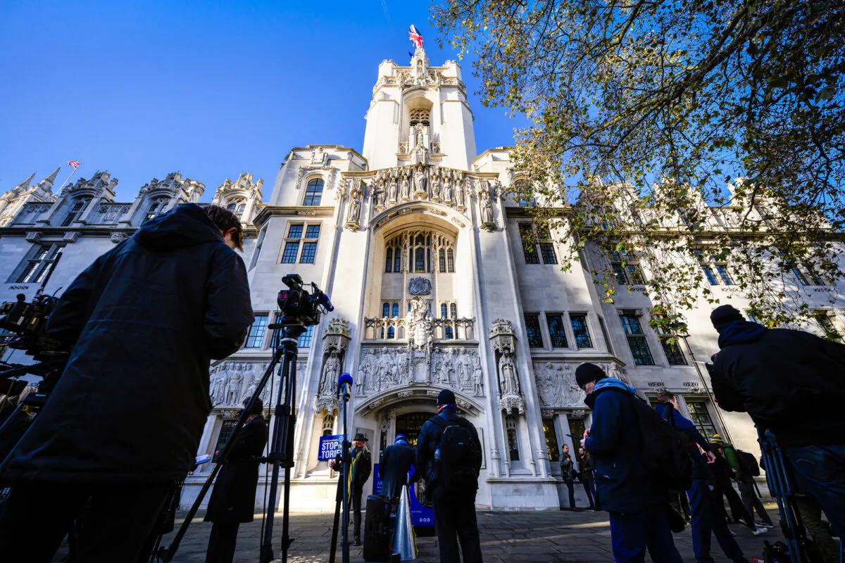 Protesters gather outside the Supreme Court in London on Nov. 15, 2023. On April 15, the UK's highest court ruled that the words "woman" and "sex" refer to "a biological woman and biological sex" in a landmark case. (Leon Neal/Getty Images)