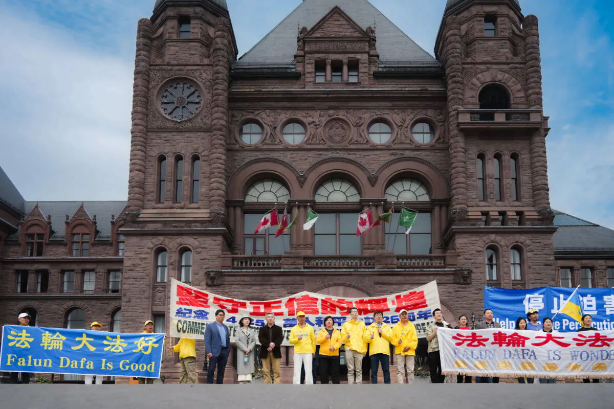 Falun Gong practitioners rally outside Ontario’s legislative building to mark the 26th anniversary of the April 25 appeal in Beijing on April 24, 2025. (Jerry Zhang/The Epoch Times)