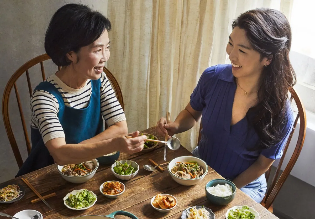Sarah Ahn (R) is the creator of Ahnest Kitchen and co-author of "Umma" with her mother, Nam Soon (L). (America's Test Kitchen/Kritsada Panichgul)