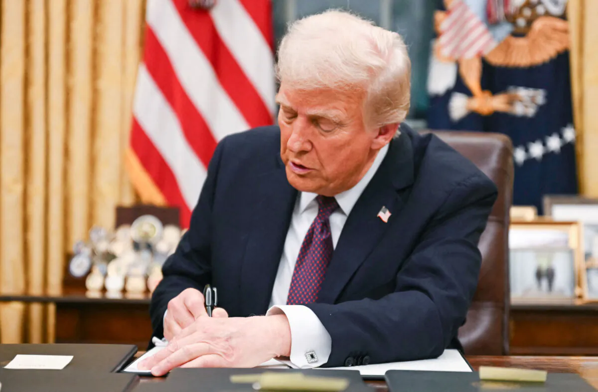 President Donald Trump signs an executive order on birthright citizenship at the White House, on Jan. 20, 2025. (Jim Watson/AFP via Getty Images)