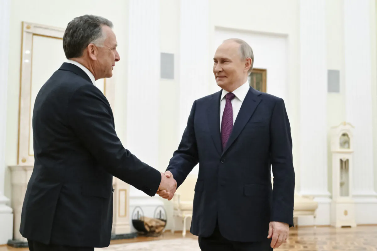Special Envoy Steve Witkoff (L) and Russian President Vladimir Putin (R) greet one another prior to talks in Moscow, Russia, on April 25, 2025. (Kristina Kormilitsyna/Pool/AFP via Getty Images)