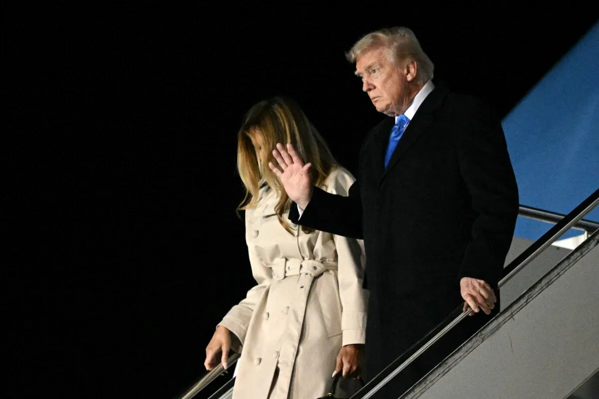 President Donald Trump and First Lady Melania Trump step off Air Force One upon arrival at Leonardo da Vinci International Airport in Rome on April 25, 2025. (Mandel Ngan/AFP via Getty Images)