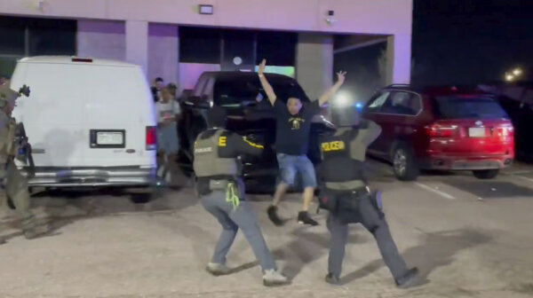 100 Illegal Immigrants Arrested in Raid