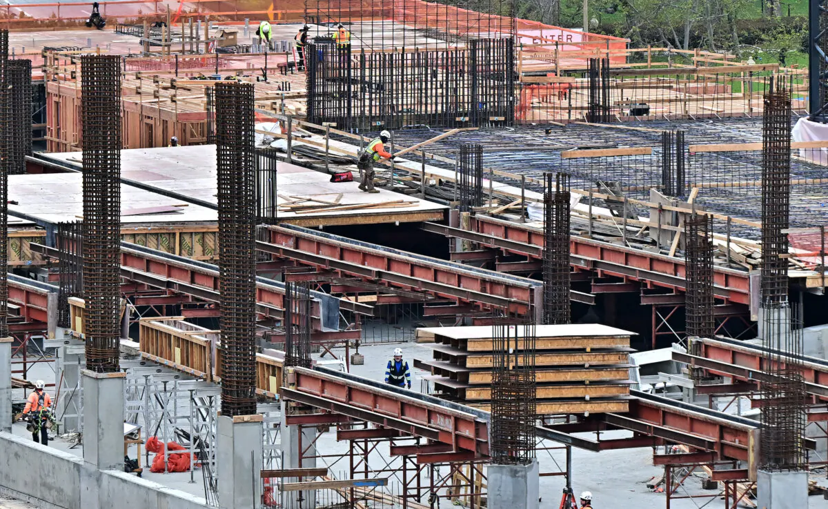 Construction workers on the site of a new development in Long Beach, Calif., on March 5, 2025. (Frederic J. Brown/AFP via Getty Images)