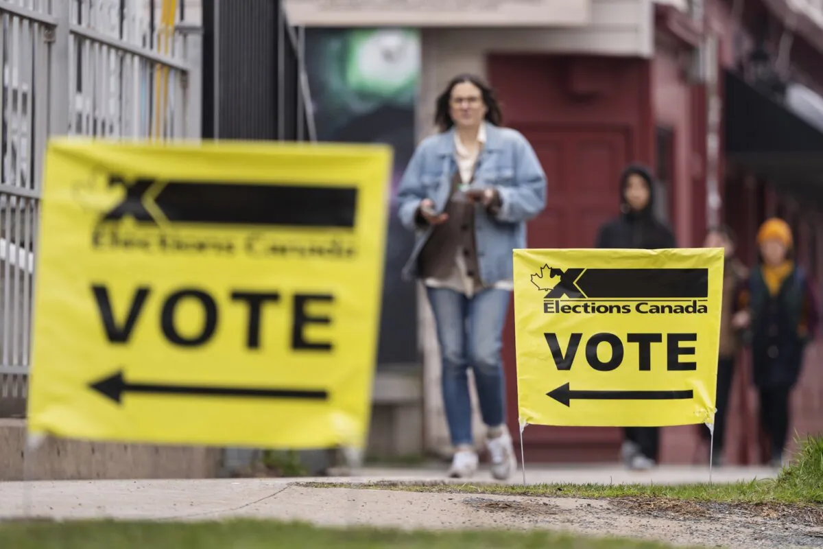 Elections Canada signage is seen as voters arrive at a polling station on election day in Halifax on April 28, 2025. (Darren Calabrese/The Canadian Press via AP)