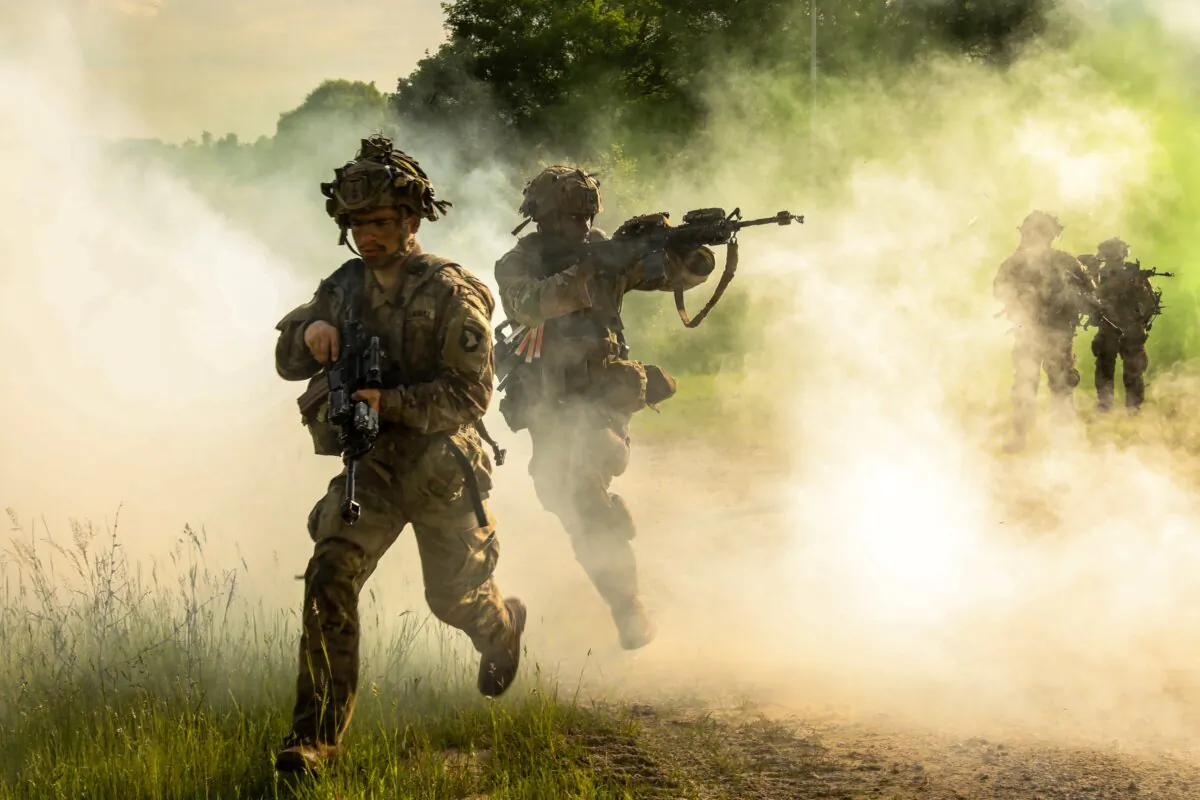 U.S. soldiers assigned to the 101st Airborne Division run for cover during Exercise Combined Resolve 24-02 at the Hohenfels Training Area, Joint Multinational Readiness Center, Germany, on June 5, 2024. (U.S. Army photo by Pfc. Jaimee Perez)