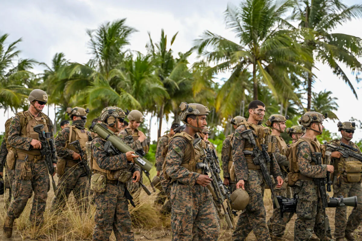 U.S. Marines walk after a counter-landing live fire exercise during the annual U.S.–Philippines joint military "Balikatan" exercise in Rizal, Palawan, on April 28, 2025. (Jam Sta Rosa/AFP via Getty Images)