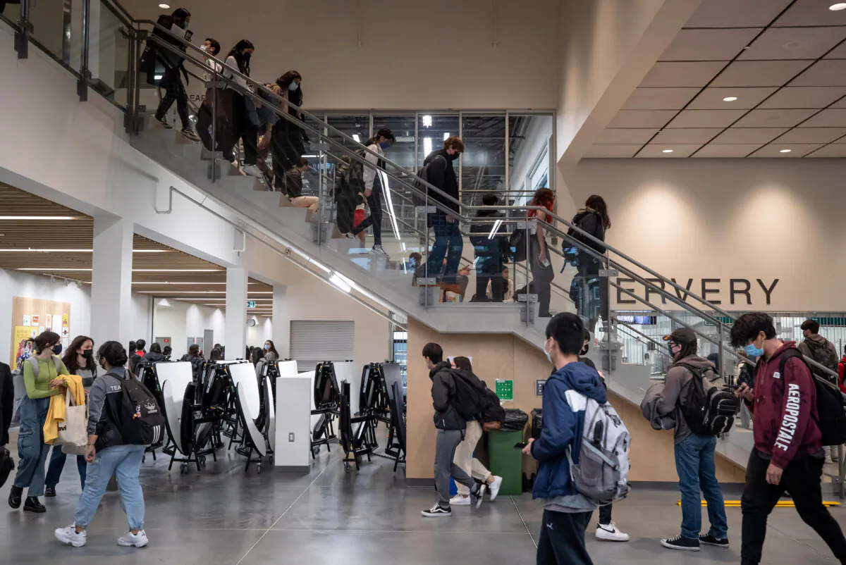 Students make their way between classes at a school in New Westminster, B.C., in a file photo. (The Canadian Press/Darryl Dyck)