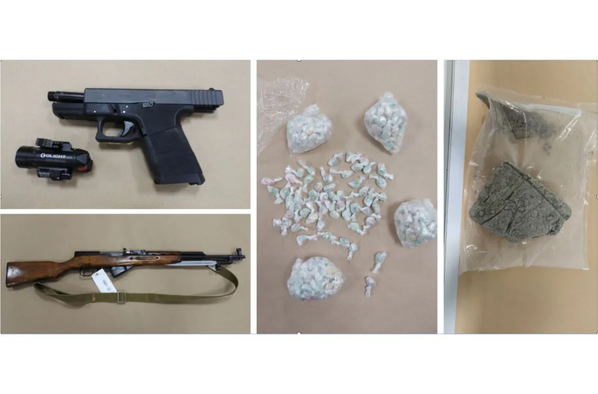 More than $150,000 worth of fentanyl and five firearms were seized in Calgary in a drug investigation. (Calgary Police Service handout)