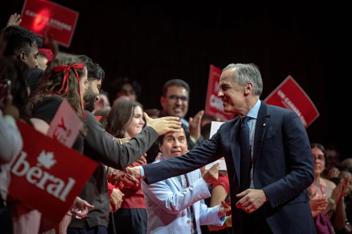 Canadian Prime Minister and Liberal Leader Mark Carney leaves after speaking to supporters following his win in the April 28 election, in Ottawa on April 29, 2025. (Andrej Ivanov/Getty Images)