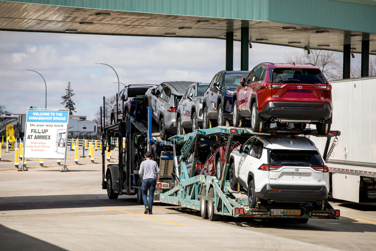 A car hauler gases up before heading to the Ambassador Bridge to cross into the United States, in Windsor, Ont., on April 1, 2025. (Bill Pugliano/Getty Images)