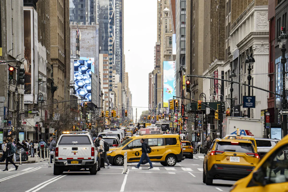 People cross a street in New York City on April 4, 2025.(Samira Bouaou/The Epoch Times)