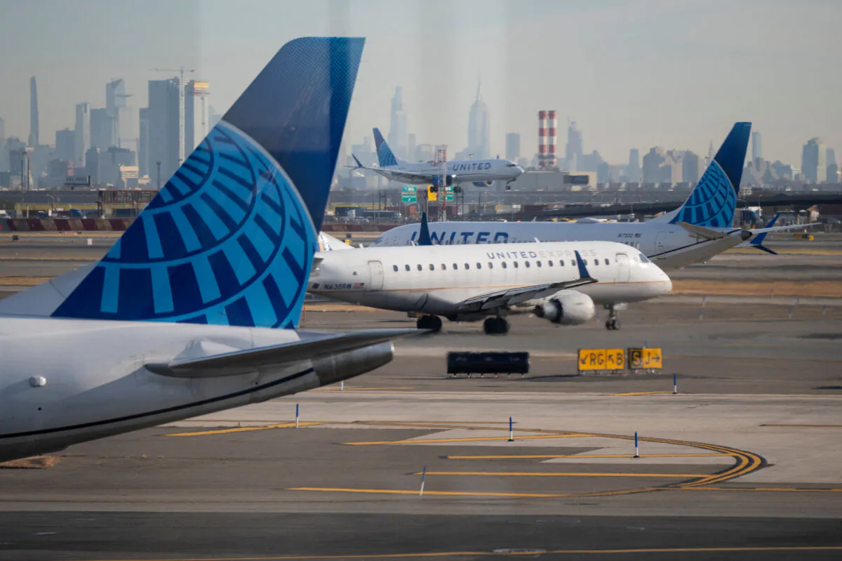United Airlines planes land and prepare to take off at Newark Liberty International Airport in Newark, New Jersey, on Nov. 27, 2024. (Vincent Alban/Reuters)
