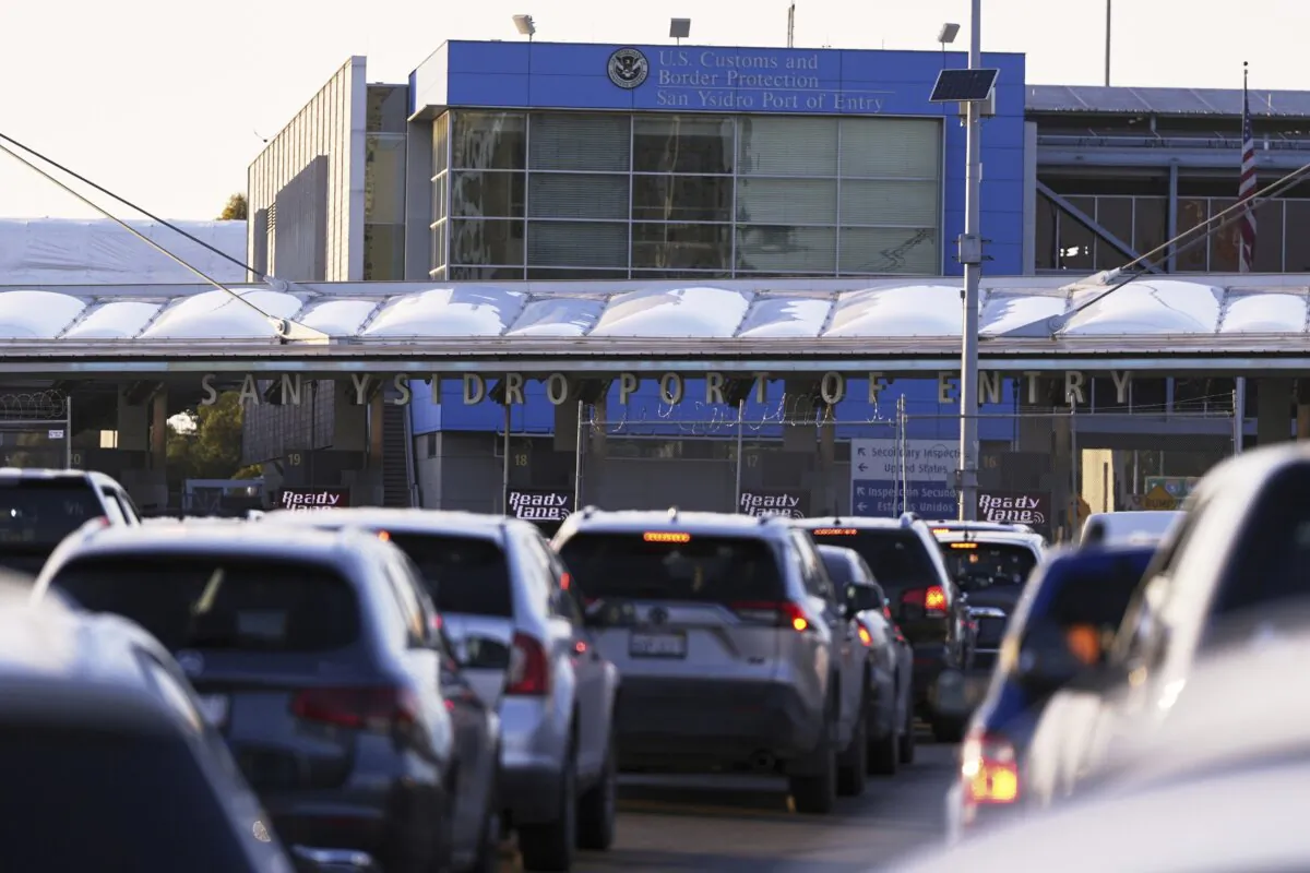 Vehicles wait in line to cross the border into the United States at the San Ysidro Port of Entry in Tijuana, Mexico, on March 18, 2025. (Gregory Bull, File/AP Photo)