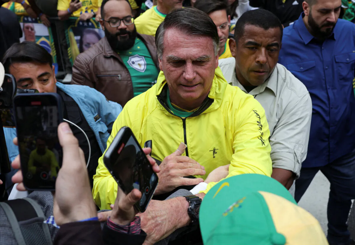 Former Brazilian President Jair Bolsonaro greets his supporters at a demonstration in Sao Paulo, Brazil, on April 6, 2025. (Amanda Perobelli/Reuters)