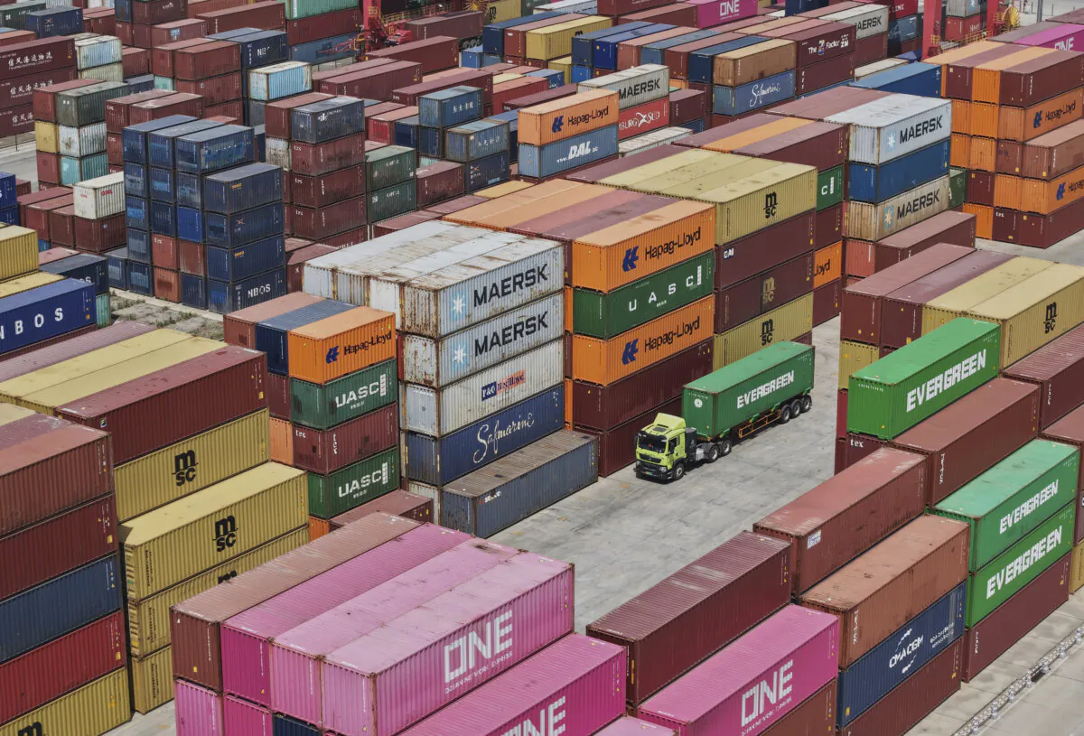 An aerial view of Xiasha Container Terminal on a canal in Hangzhou, Zhejiang Province, China, on April 6, 2025. (Chinatopix Via AP)