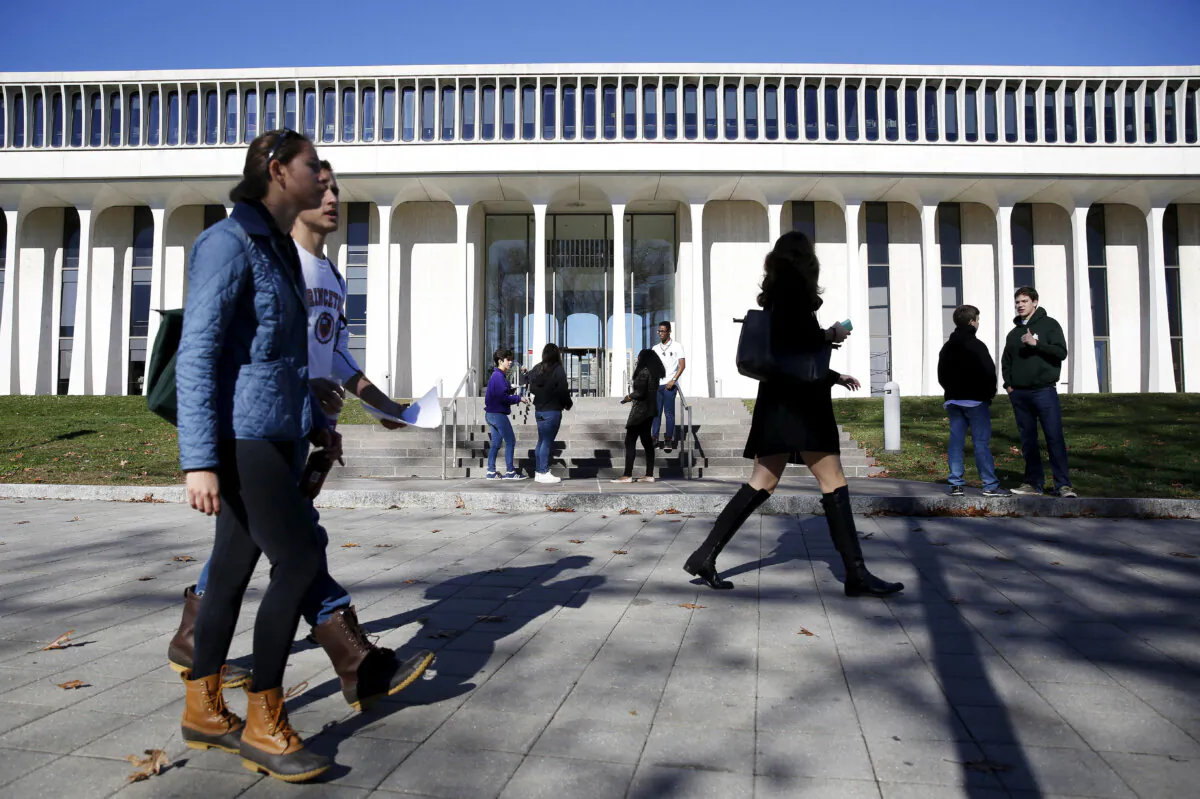 People walk past Princeton University's Woodrow Wilson School of Public and International Affairs in Princeton, N.J., on Nov. 20, 2015. (Dominick Reuter/Reuters)