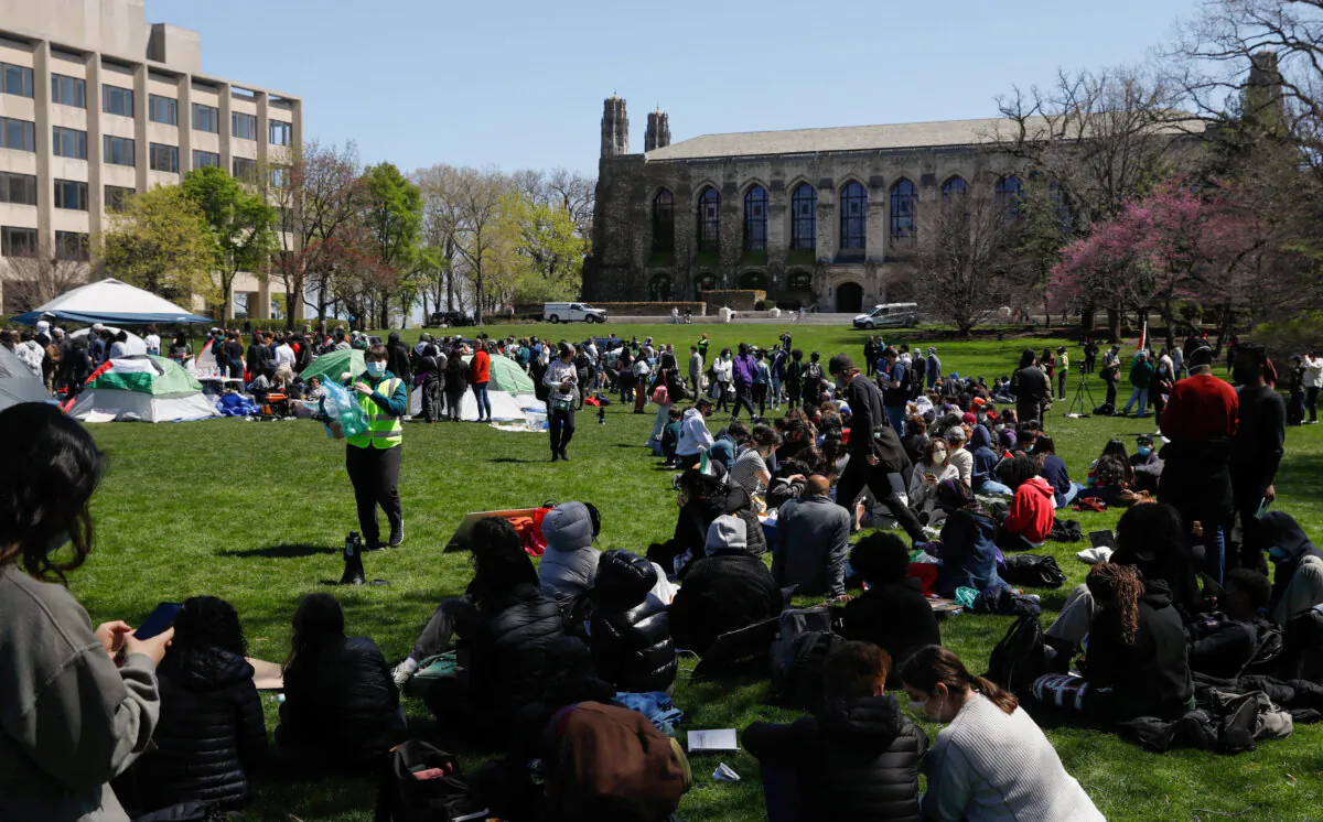 Demonstrators gather at an encampment where students are protesting in support of Palestinians, during the ongoing conflict between Israel and Hamas, at Northwestern University campus in Evanston, Ill., on April 25, 2024. (Nate Swanson/Reuters)