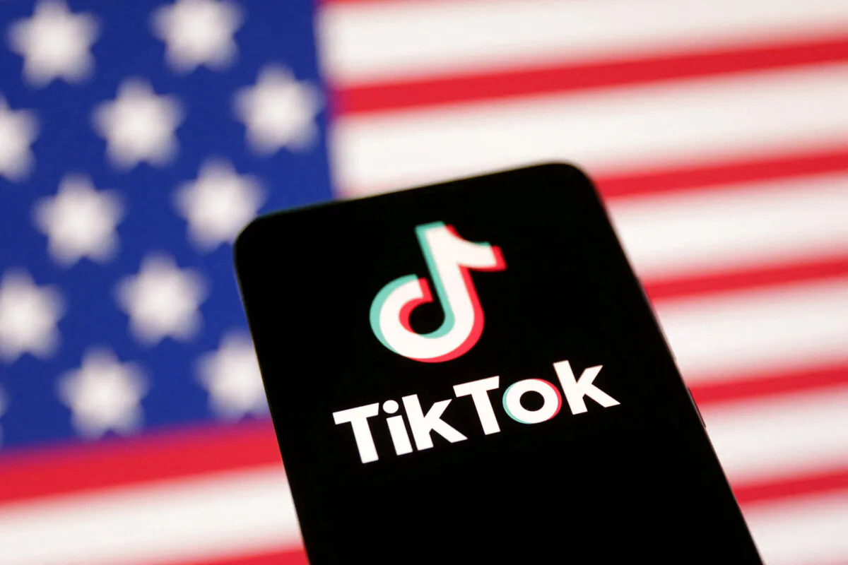 The U.S. flag and TikTok logo are seen in this illustration taken Jan. 8, 2025. Reuters/Dado Ruvic/Illustration/File Photo