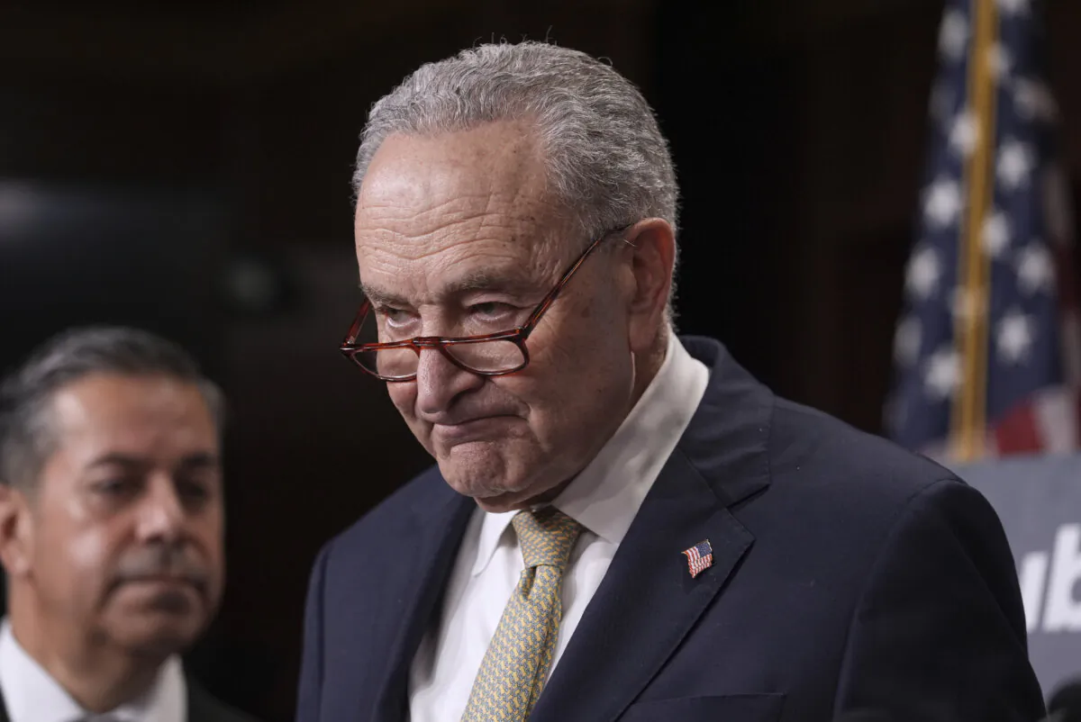 Senate Minority Leader Chuck Schumer (D-N.Y.), joined by Sen. Ben Ray Lujan (D-N.M.) , speaks to reporters at the Capitol, in Washington on April 4, 2025. (AP Photo/J. Scott Applewhite)