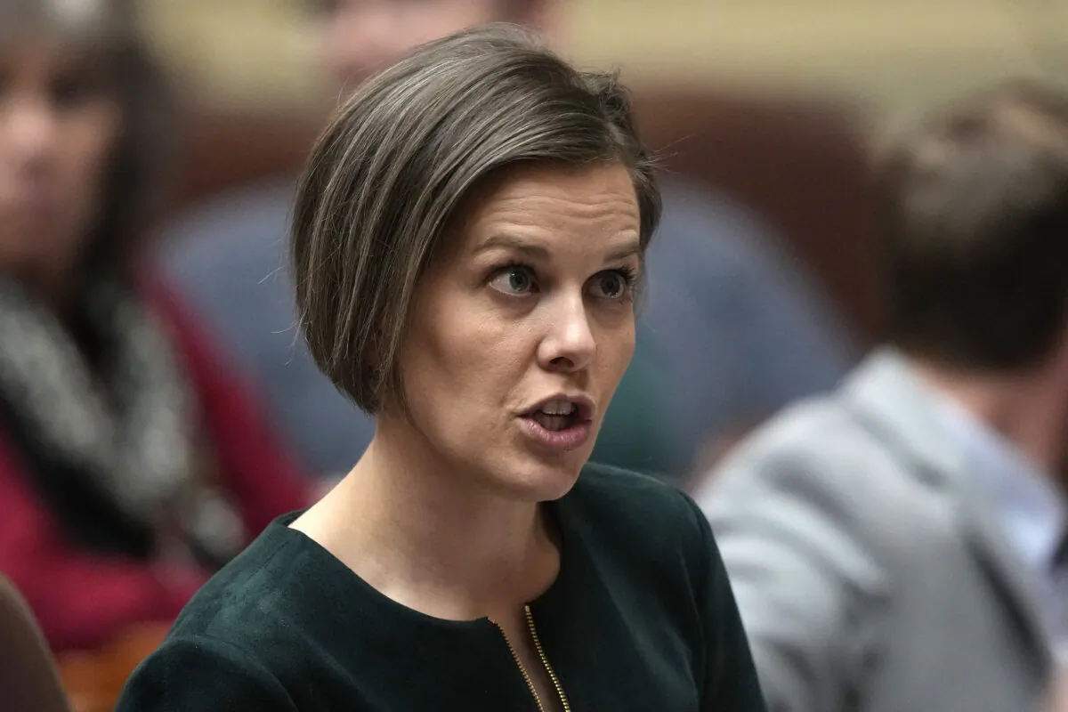 Maine State Rep. Laurel Libby (R-Auburn), speaks with a colleague at the State House in Augusta on Feb. 14, 2023. (Robert F. Bukaty/AP File)