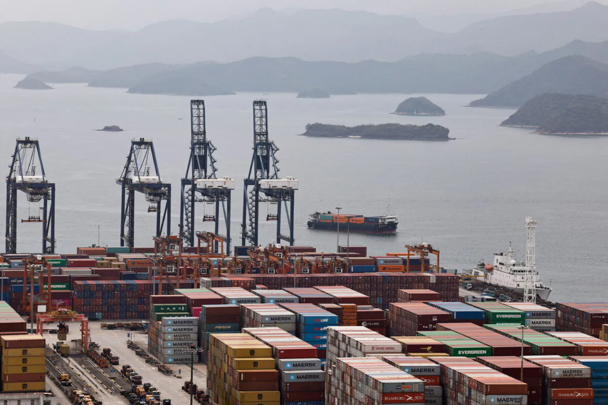 A cargo ship carrying containers approaches towards the Yantian port in Shenzhen, China, on April 17, 2025. (Tingshu Wang/Reuters)