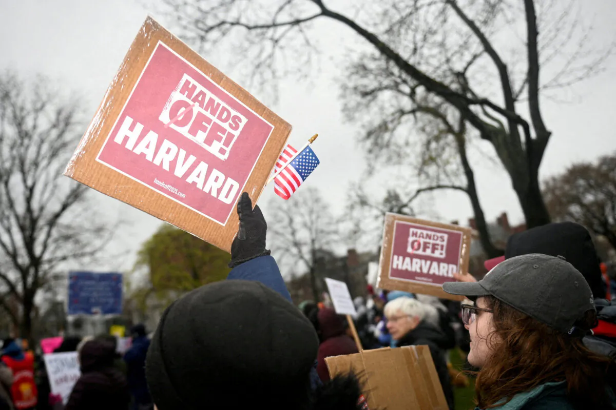 Demonstrators rally on Cambridge Common in a protest organized by the City of Cambridge calling on Harvard leadership to resist federal government demands at the university, in Cambridge, Mass., on April 12, 2025. (Nicholas Pfosi/Reuters)