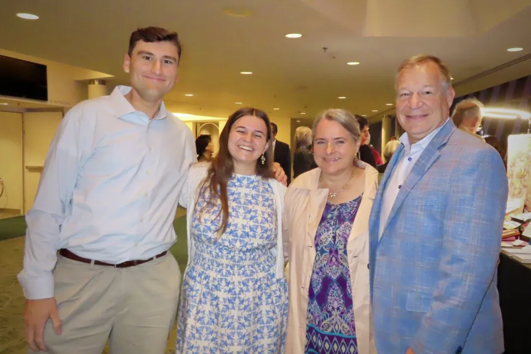Greg Grulikowski (R), Elizabeth Grulikowski, and Tate Pflum at the Shen Yun Performing Arts performance at Performing Arts Center San Luis Obispo on April 30, 2025. (Alice Sun/The Epoch Times)