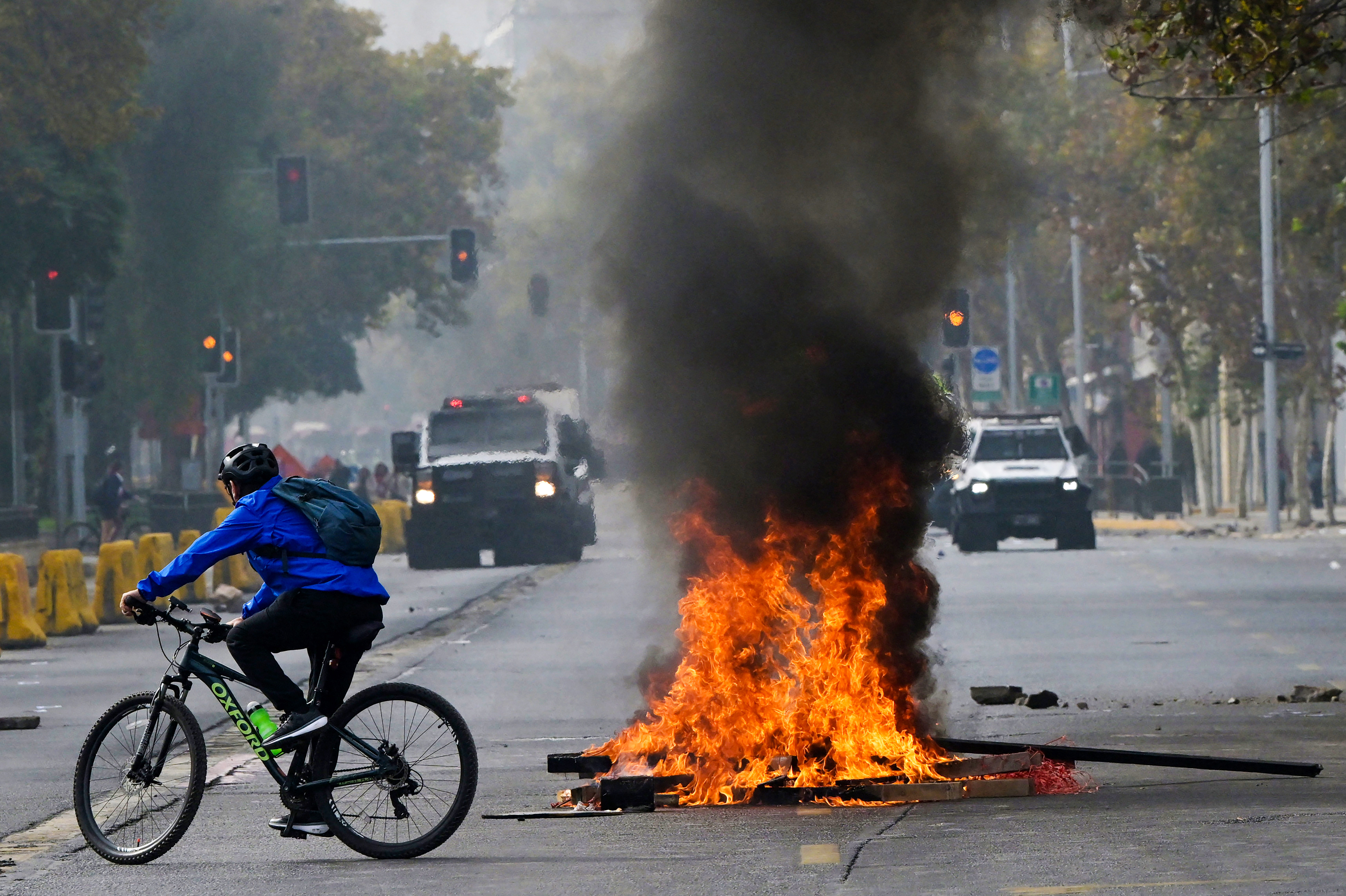 Day in Photos: May Day Protests, Sandstorm in Syria, and Celtic Traditional Dancing