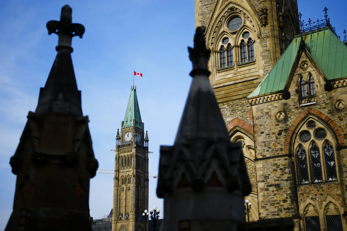 The Canadian flag flies atop the Peace Tower on Parliament Hill in Ottawa on Oct. 30, 2024. (The Canadian Press/Sean Kilpatrick)