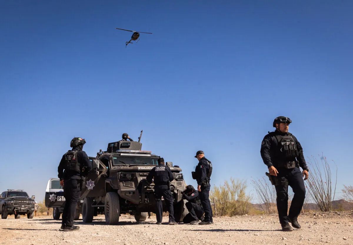 Police officers conduct an operation in the deserts of Sonora, Mexico, on April 15, 2025. (John Fredricks/The Epoch Times)